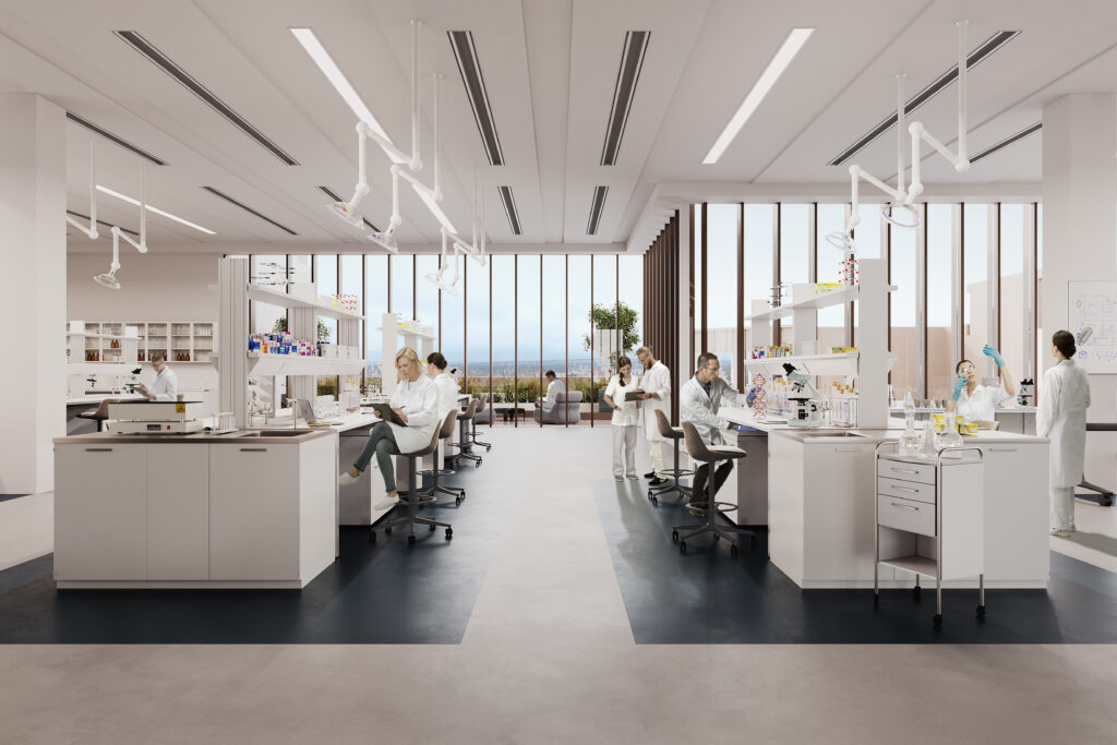 A lab at Origin Cambridge with scientists and researchers sat using the space.